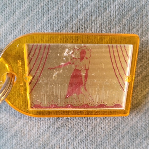 Picture Changing Keychain - Lady Changing Clothes Jewelry Store Ho Phone Cary NC - Picture 10 of 12